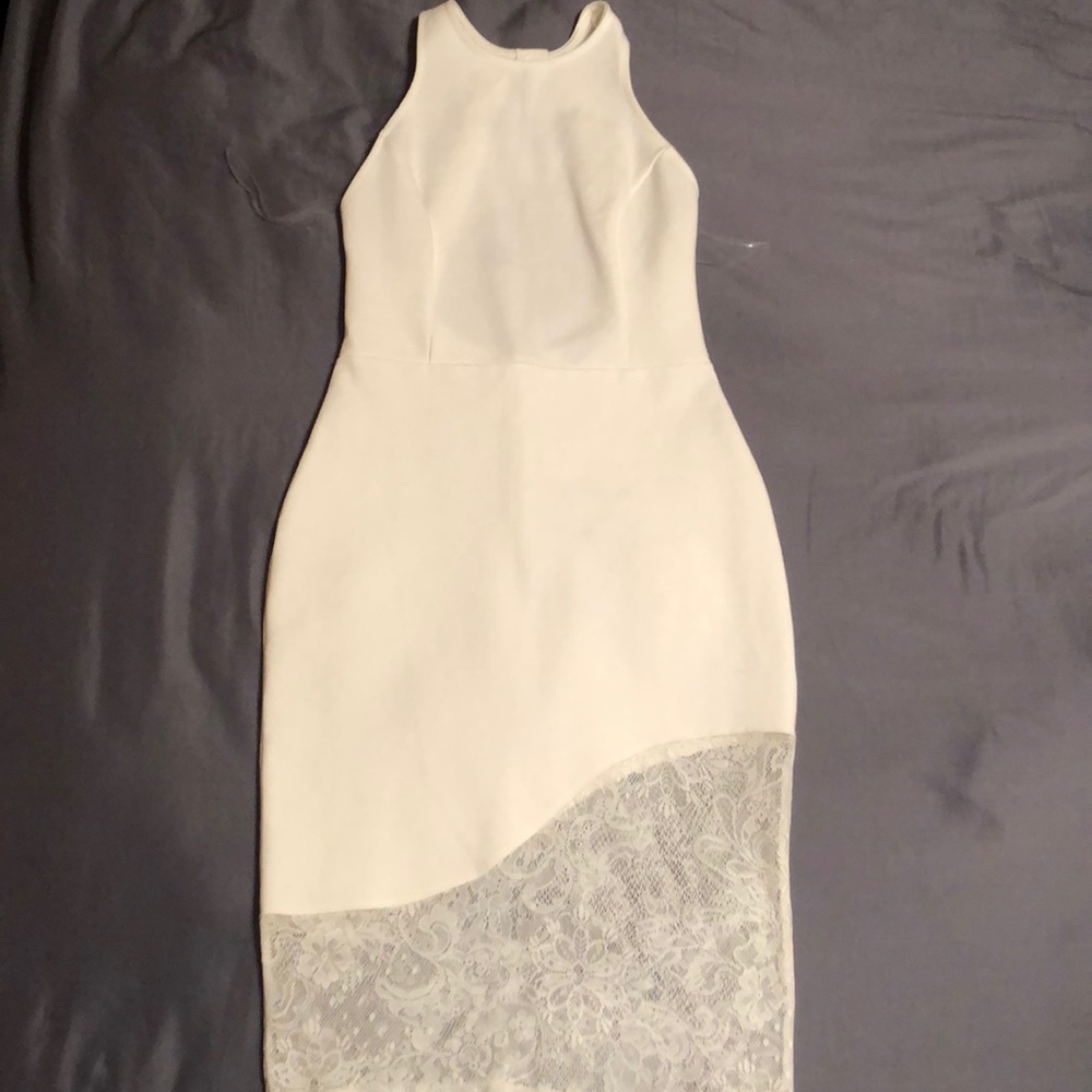 White dress with lace on the bottom